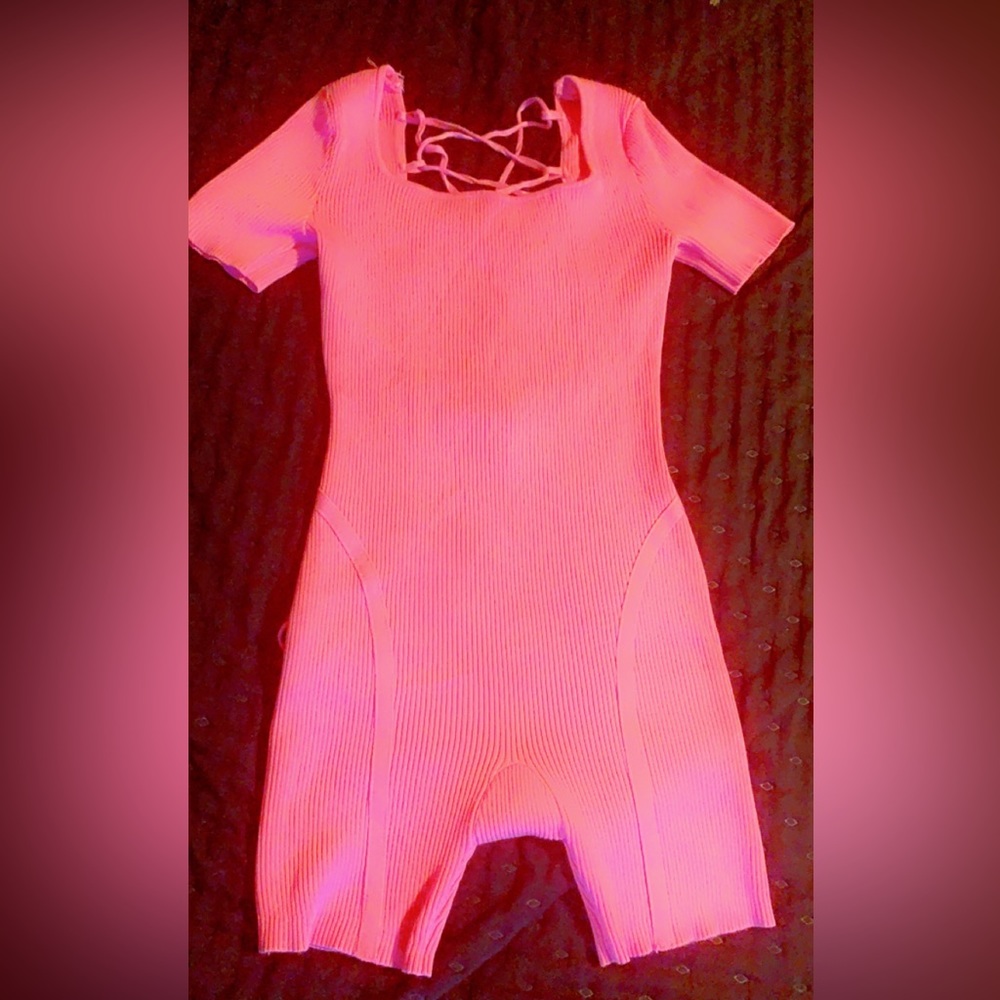Pink body suit